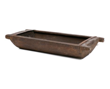 A rectangular adzed wood salting trough with central draining hole, 87 x 37.5cm.