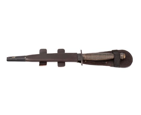 A British Third Pattern Fairbairn Sykes Fighting Knife,  the straight double edged blade above oval hilt stamped 'William Rod
