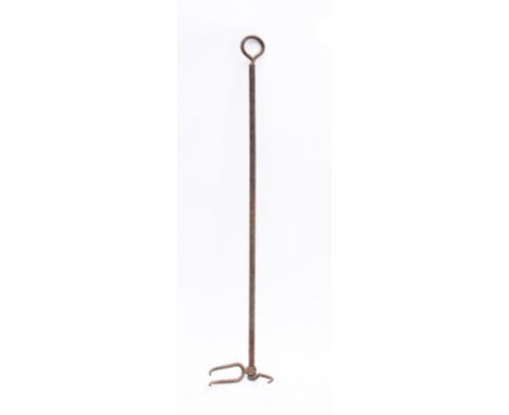 An adjustable iron flesh fork,  with key end adjustable tine, 124cm long.