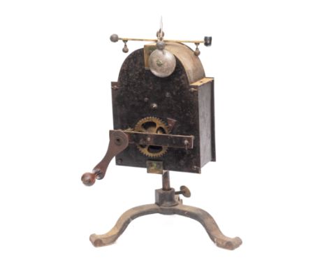 A 19th Century Continental clockwork spit engine of domed outline with brass governor and bell surmount on an iron tripod bas