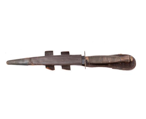 A British Third Pattern Fairbairn Sykes Fighting Knife, the straight double edged blade on a blued oval hilt stamped 'Sheffie