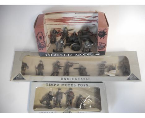 Timpo Set No 910 U.S. Army, four plastic figures, Set No 916 U.S. Army eight plastic figures, and Herald, Set No 4307 Five In