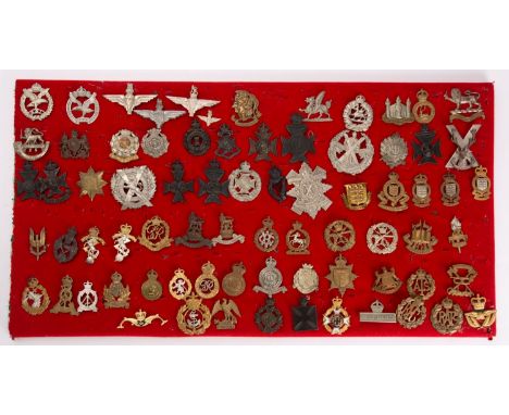 A collection of British Military cap badges including RAF and RFC, Parachute Regiment, Army Educational Corps, Glider Pilot R