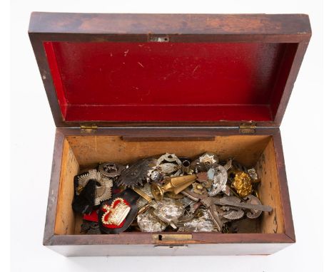 A collection of various British & Commonwealth Regimental cap badges and insignia: including several Parachute Regiment, Aust