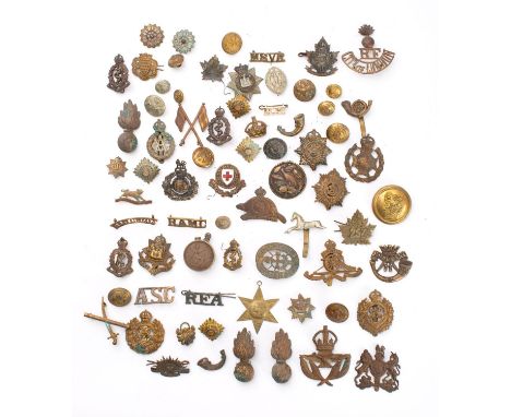 A collection of Regimental cap and shoulder badges,  including  Regiment Canadian Francais, City of London Royal Fusiliers, R