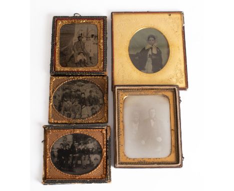 A collection of three late 19th/ early 20th century ambrotypes; comprising one of a gentleman with two children beside a  boa