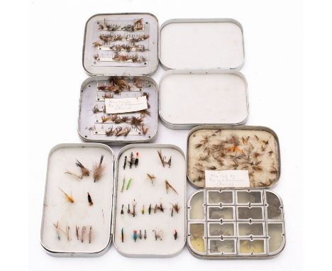 Two aluminium fly tins with steel eye flies both with manuscript note 'Flies tied by Rev W E Bannerman, Levens', together wit