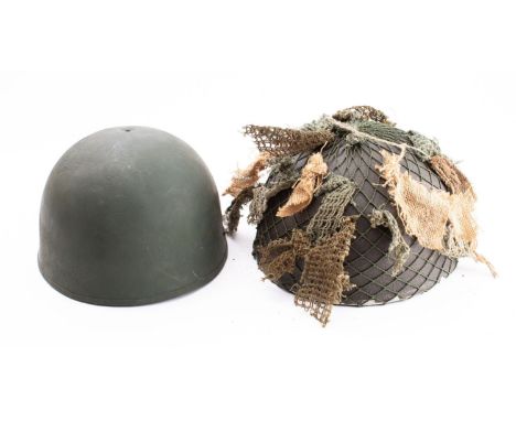 A post war British Army Airborne Division steel helmet by CWL size 7 3/8ths. original lining with brown leather headband stam