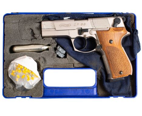 An Umarex Walther  Model CP88 .177 CO2 air pistol,  serial number 'A24430327', nickel finish with two piece wooden grip, case