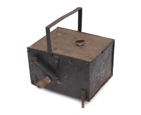 A 19th Century Continental clockwork spit engine with a 17cm diameter brass wheel, contained in an oblong blackened metal cas