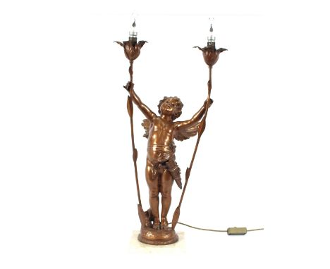 A bronzed cherub table lamp, raised on a marble plinth, 72cm high