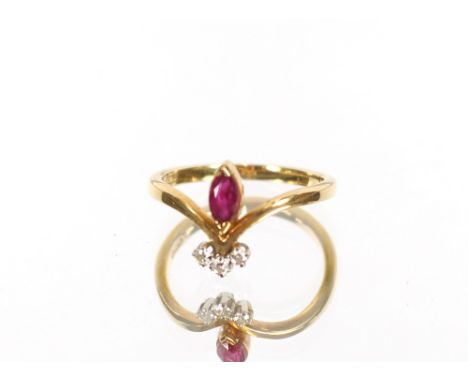 An 18 carat gold ruby and diamond dress ring