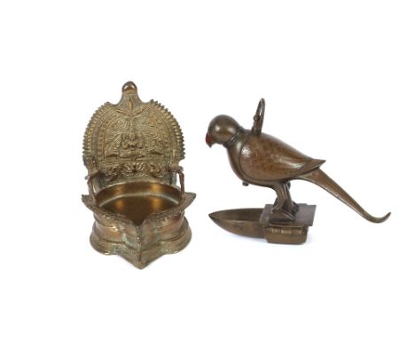 A 19th Century Indian bronze lamp, in the form of a Falcon, 13cm high; and a 19th Century bronze oil lamp in the form of a Hi