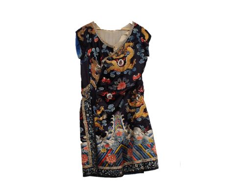 A Chinese cloak, having gilt thread decoration of dragon, blue flaming pearls and clouds