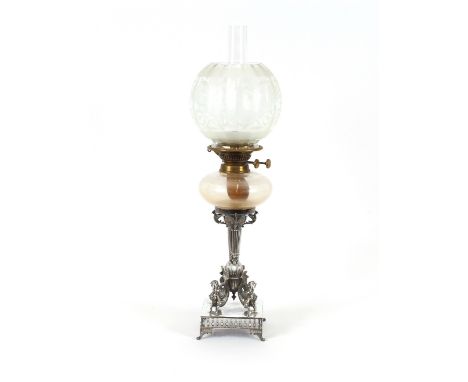 A Victorian plated table oil lamp, having fluted baluster column supported on mythological scrolling horses, on a square balu