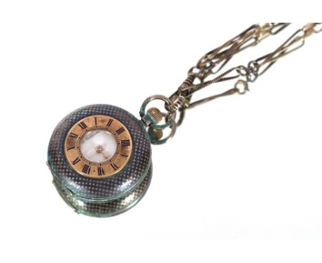 A white and yellow metal Niello decorated half hunter ladies fob watch, hung to a fine white metal link chain, with blush eas