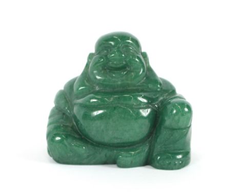 A small Jade figure of a seated Buddha