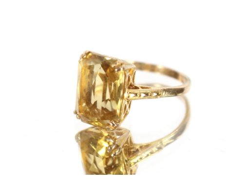 A large citrine 9 carat gold mounted ring; and a diamond set gold mounted ring, (2)