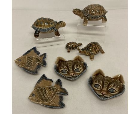 A collection of vintage Wade ceramics. 4 tortoise figures and lidded trinket boxes.  Together with 2 cat pin dishes and 2 fis
