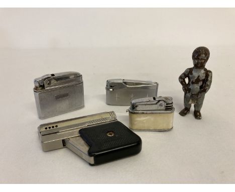 A collection of 5 vintage lighters to include novelty. Lot includes one in the shape of a boy relieving himself and an Imco S