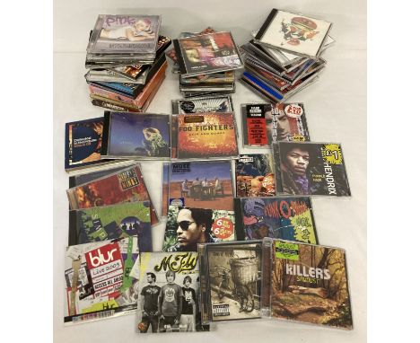 A box of 40+ music cd's, various artists and genres.  Artists include: Foo Fighters, Oasis, Simple Minds, Blur, The Killers, 
