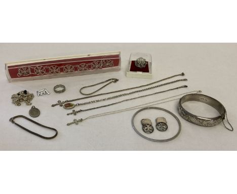 A collection of vintage silver and white metal costume jewellery.  To include: half engraved vintage bangle with safety chain