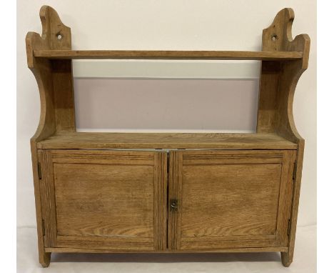 A vintage pine wall hanging 2 door cupboard with shelf. Complete with interior shelf and key.  Approx. 60.5 x 59 x 16cm.