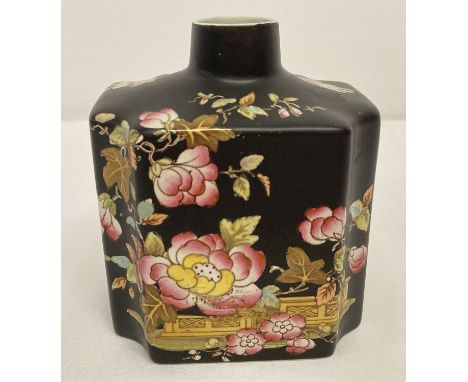 An Adams Tunstall ceramic tea caddy/canister with Famille noir design.  Lid missing.  Approx. 12.5cm tall.