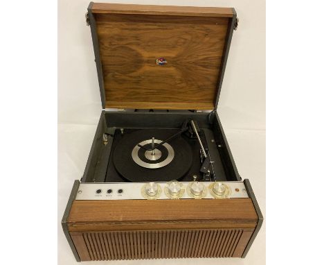 A vintage 4042 Marconi record player with built in speaker, in natural wood finish.  