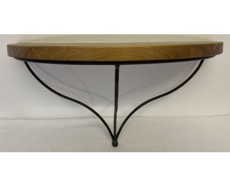 A modern pine and wrought iron wall hanging shelf.   Approx. 30 x 58 x 30cm.
