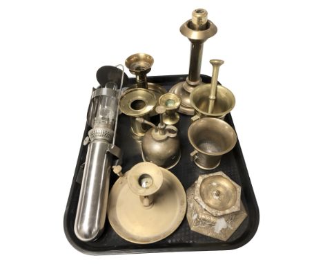 A group of brass candlesticks, mortars, stainless steel hanging oil lamp, etc.