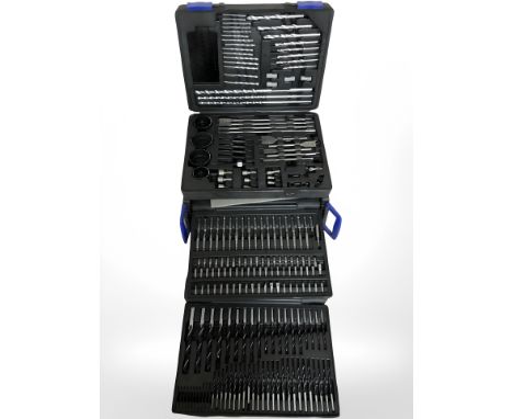 A Nutool three compartment tool chest containing drill bits.