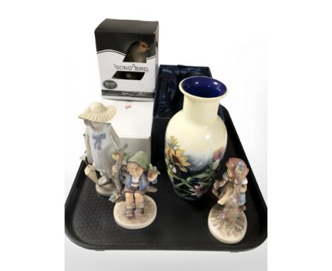 An Old Tupton Ware porcelain vase, two Goebel figures, boxed Nao figure of a girl and a Vivid Arts songbird ornament.