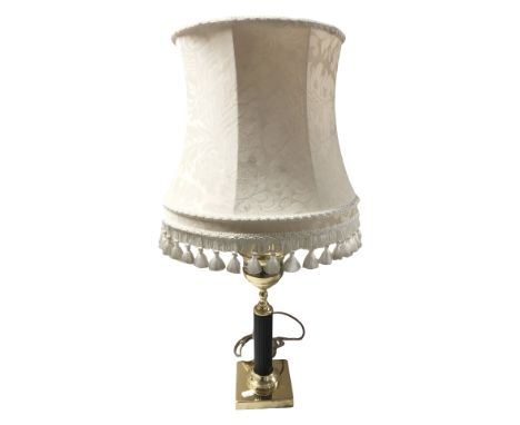 A brass table lamp with tasseled shade, height 70 cm 