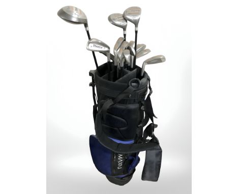 A golf bag containing Theory titanium reinforced clubs.