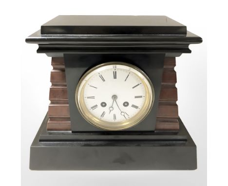 An Art Deco slate and marble eight day mantle clock, width 30 cm.