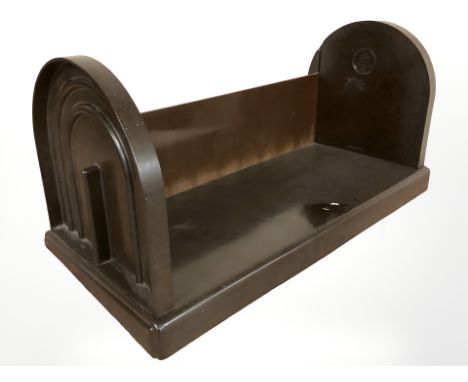 An Ebco Bakelite book trough, width 49 cm.