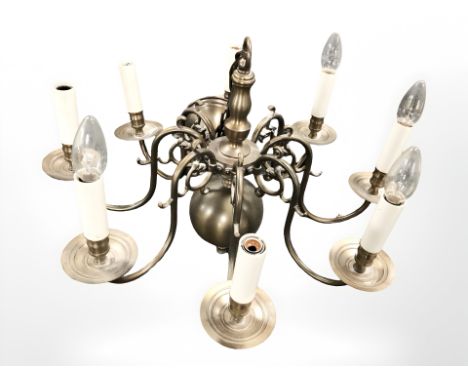 A brass chandelier, diameter 57 cm.