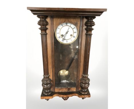 An early 20th century Junghans walnut cased wall clock 