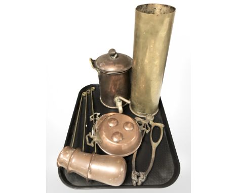 A large brass ammunition shell, a small copper samovar, graduated set of three copper and brass measures, two moulds and a pa