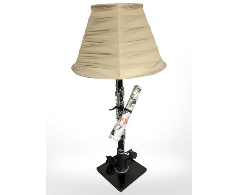 A 'clarinet' table lamp, height 82 cm.