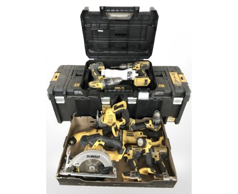 A collection of DeWalt power tools including DCS391 circular saw, cordless drills, jigsaw, etc. (all lacking batteries)