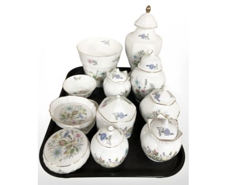A collection of Aynsley Wild Tudor porcelain including lidded jars, planter, shallow dishes, etc.