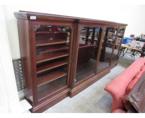  Sale Item:    MAHOGANY BREAKFRONT BOOKCASE 11' X 5'  Vat Status:   No Vat   Buyers Premium:  This lot is subject to a Buyers
