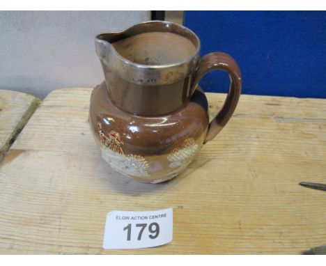  Sale Item:    DOULTON LAMBETH SILVER RIM HUNTING JUG  Vat Status:   No Vat   Buyers Premium:  This lot is subject to a Buyer