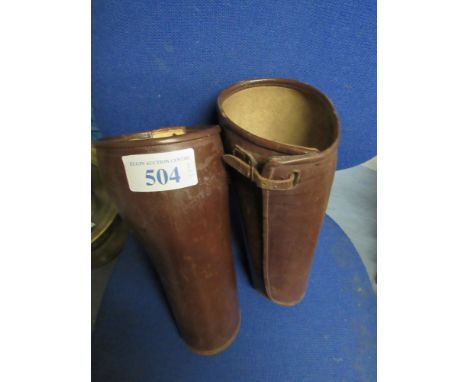  Sale Item:    2 LEATHER LEG PROTECTORS   Vat Status:   No Vat   Buyers Premium:  This lot is subject to a Buyers Premium of 