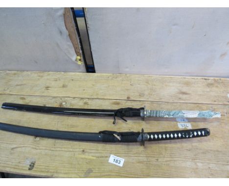  Sale Item:    2 REPRO SAMURAI SWORDS   Vat Status:   No Vat   Buyers Premium:  This lot is subject to a Buyers Premium of 15
