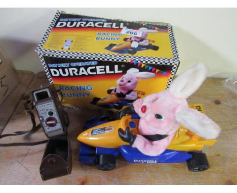  Sale Item:    DURACELL RACING CAR BUNNY & CASED CINE CAMERAS BELL & HOWELL  Vat Status:   No Vat   Buyers Premium:  This lot