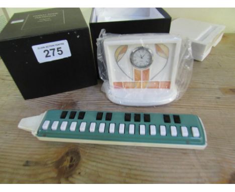  Sale Item:    BOXED C RENNIE MACKINTOSH CLOCK & FLUTE  Vat Status:   No Vat   Buyers Premium:  This lot is subject to a Buye