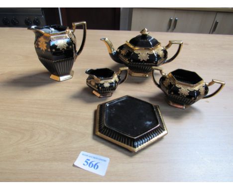  Sale Item:    4 PCE BLACK & GOLD TEA SERVICE   Vat Status:   No Vat   Buyers Premium:  This lot is subject to a Buyers Premi